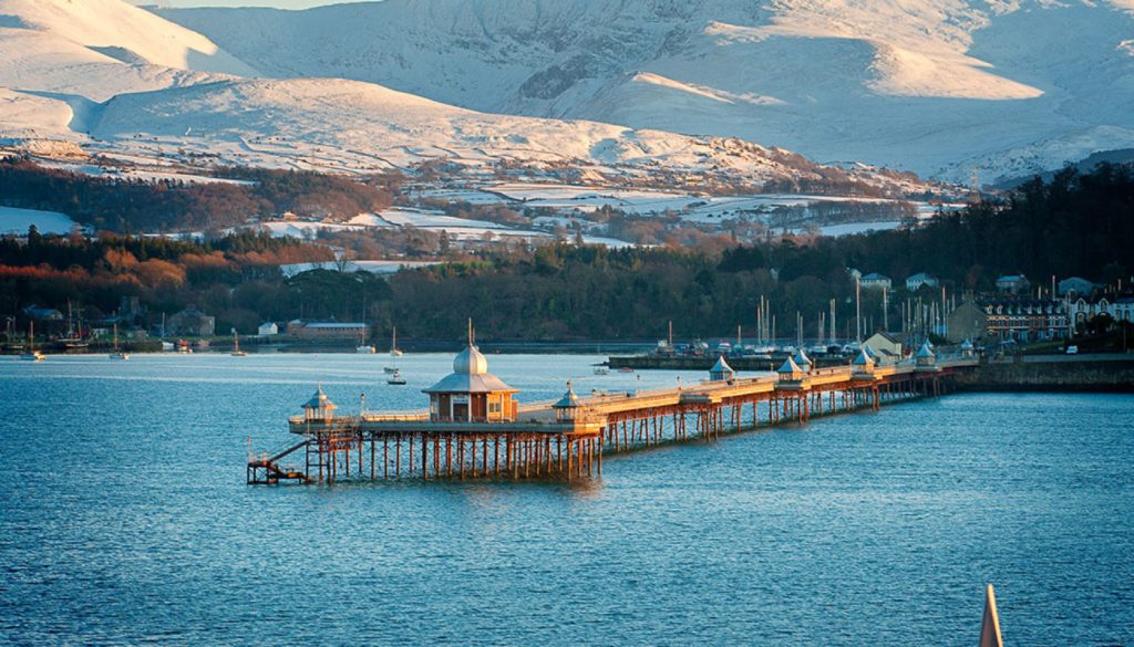 Pier Bangor Snow on mountains in distance Menai Strait North Towns And Villages